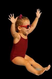 Kid sliding down the water slide